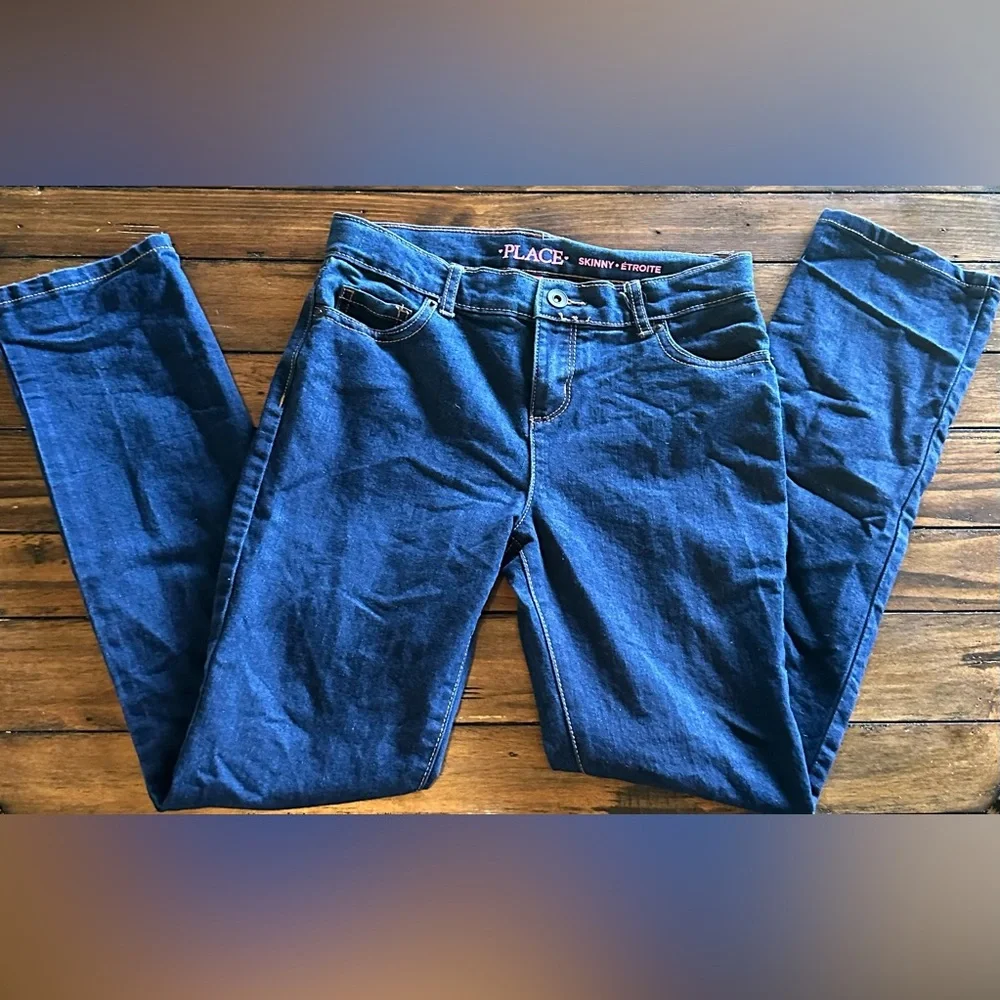 The Children’s Place girls jeans size 12. medium wash and dark wash 2 pairs!